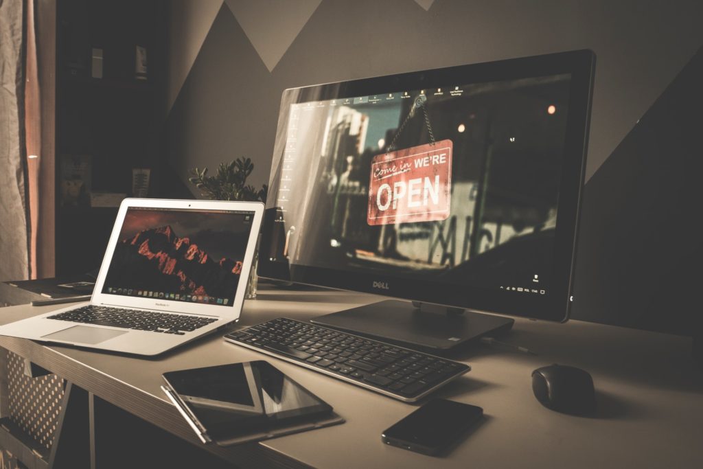 computers and tablets on a desk