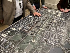 photo of people engaging with the National Mall tactile map in the Capitol building