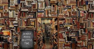 A wall of books at varying angles. A chalkboard sign reads "So many books, so little time"