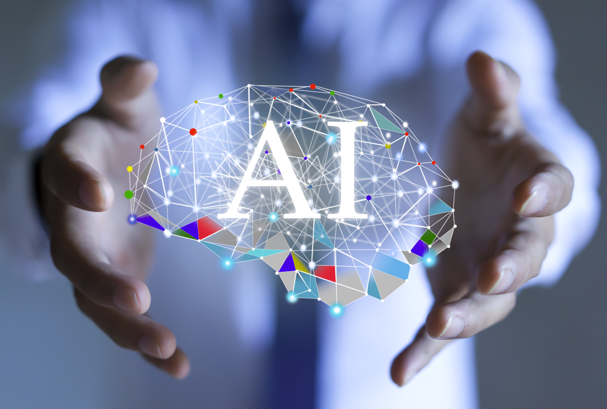 illustration of a digital brain labelled AI within a pair of hands