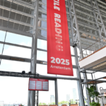 photo from the Tactile Reading 2025 event showing a branded banner
