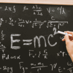 Chalk board covered in math and scientific equations